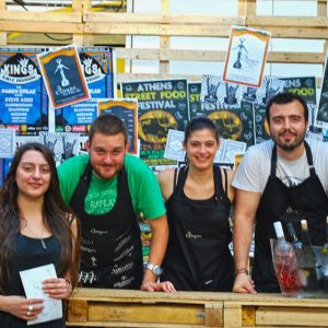 Cinque Wine & Deli team serving wine by the glass at the first Athens Street Food Festival, showcasing wine as part of everyday food culture.