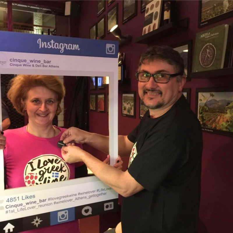 Guests posing with an Instagram frame at Cinque Wine & Deli Athens during the 1st #WineLover & #LifeLover reunion event.