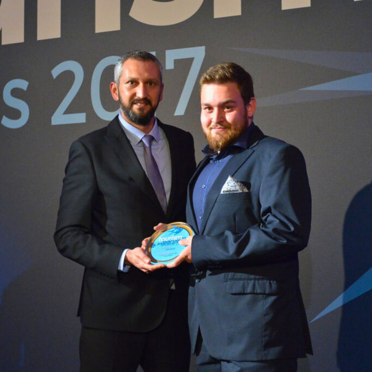 Nikitas Prassas receiving the Bronze Award for Wine Culture at the Tourism Awards 2017 on behalf of Cinque Wine & Deli in Athens.