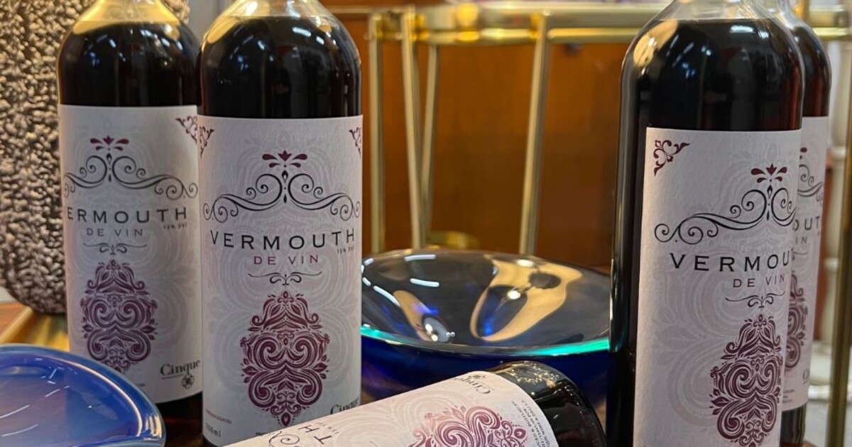 Cinque Vermouth bottles displayed at Cinque Wine & Deli highlighting Greek botanicals and wine-based vermouth