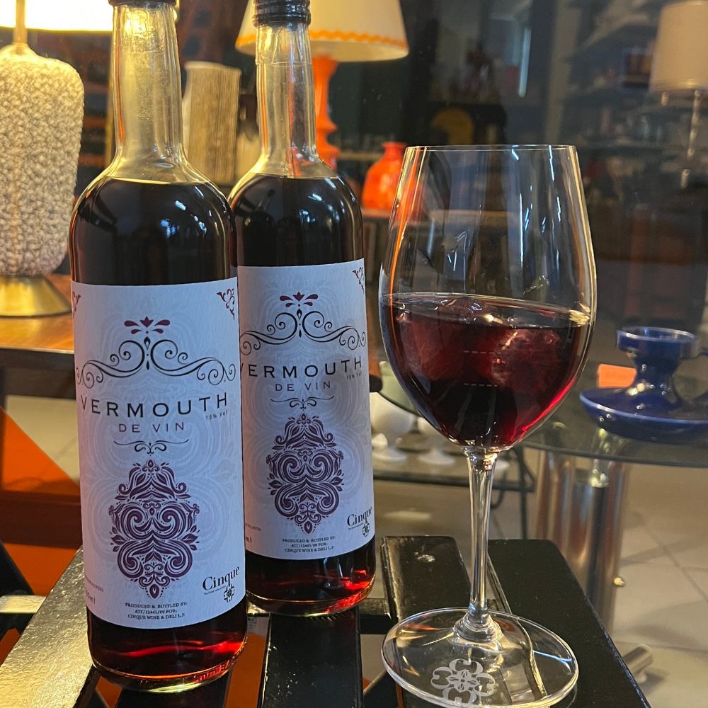 Cinque Vermouth bottles displayed at Cinque Wine & Deli highlighting Greek botanicals and wine-based vermouth