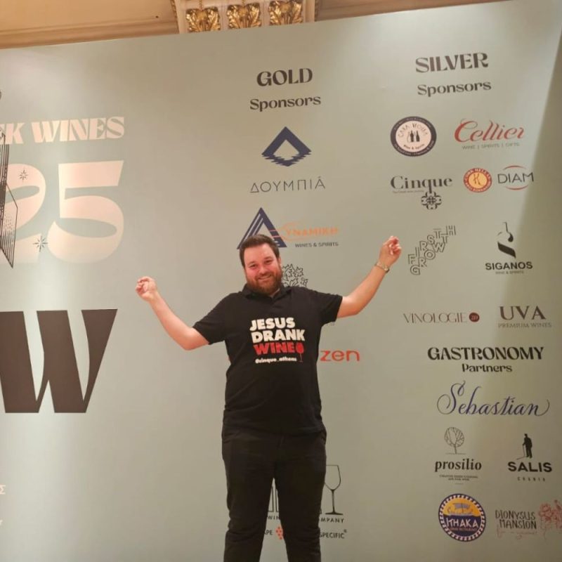 Cinque representative at Great Greek Wines 2025 sponsor wall, celebrating participation and support of Greek wine excellence.