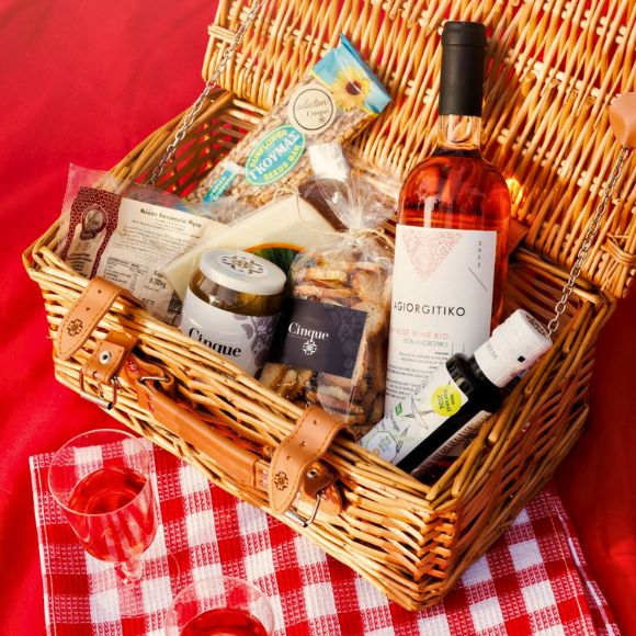 Cinque gift basket with Greek rosé wine and gourmet deli products in wicker packaging
