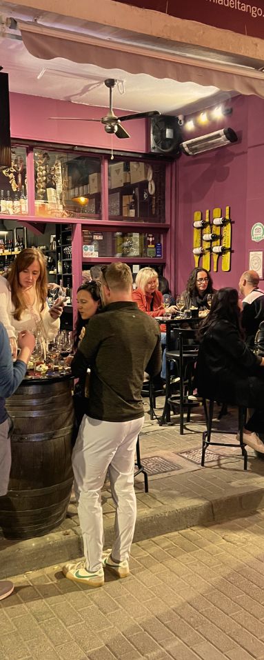 Guests enjoying wine at Cinque Origin, the original intimate boutique wine bar concept.