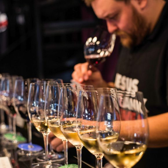 Wine tasting lineup at Cinque Wine & Deli with guided evaluation by the founder