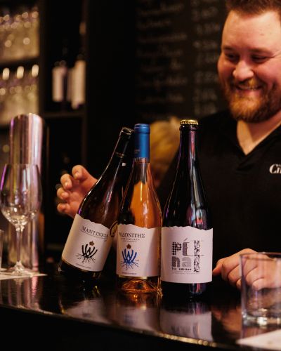 Founder Nikitas Prassas presents exclusive Greek wines, offering personalized recommendations for every visitor at Cinque Monastiraki.