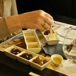 Advanced Greek extra virgin olive oil tasting with olive oil samples and traditional accompaniments at Cinque Wine & Deli Athens.