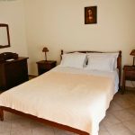 Traditional bedroom in the Assyrtiko Suite at Casa Cinque in Lamia, Central Greece