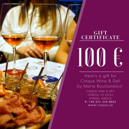 Cinque Experience Gift Card €100 displayed with wine glasses and Greek delicatessen dishes at Cinque Wine & Deli Bar in Athens