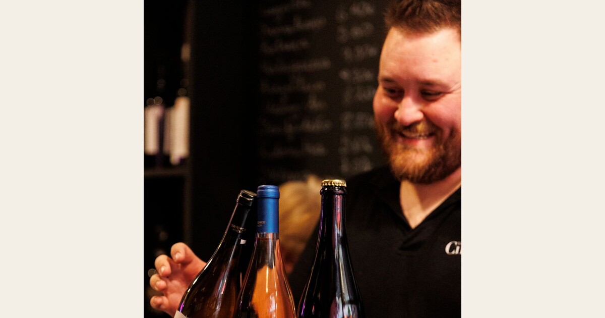 Sommelier at Cinque Wine & Deli presenting rare Greek wines from the Collector’s Glass List
