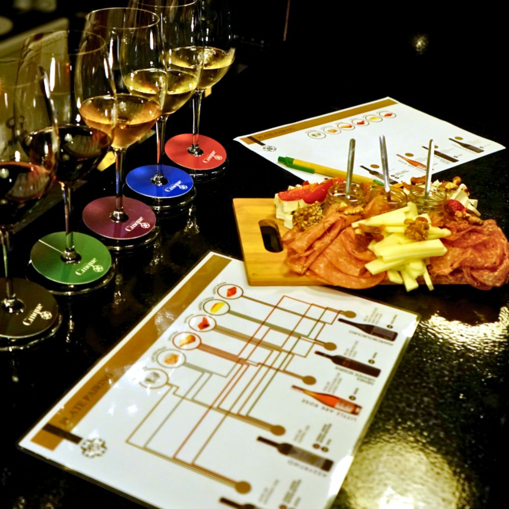 Greek wine and food pairing with five wines and charcuterie board at Cinque Wine & Deli