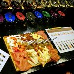 Greek wine and food pairing with charcuterie, cheeses and multiple wine glasses served at Cinque Wine & Deli