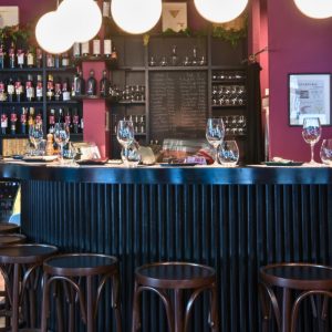 Interior view of a Cinque Wine Bar showing bar counter, wine display and seating layout, reflecting the brand’s hospitality-focused franchise design philosophy.