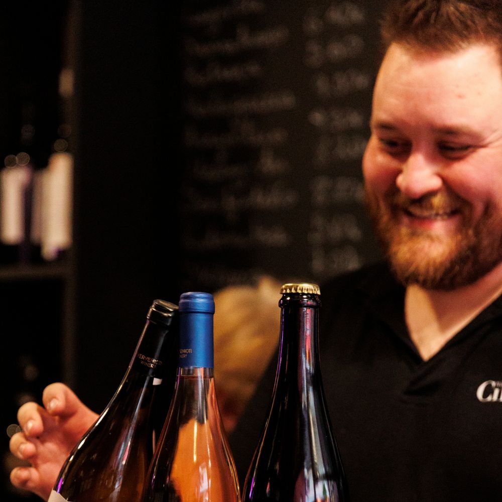 Sommelier at Cinque Wine & Deli presenting rare Greek wines from the Collector’s Glass List