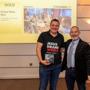 Cinque Wine Bars receiving the Gold Award for Experience at the Estia Awards 2024 ceremony