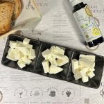 Greek feta tasting with sheep’s milk feta, goat’s milk feta and barrel-aged feta served with toasted bread at Cinque Wine & Deli