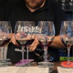 Guided Greek red wine tasting with multiple red wine glasses at Cinque Wine & Deli