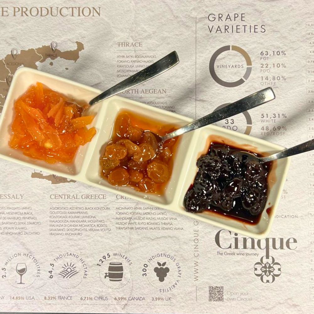 Greek spoon sweets tasting with quince, grape and sour cherry preserves served as a traditional deli experience at Cinque Wine & Deli