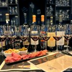 Premium Greek red wine tasting with seven wines, charcuterie and olives at Cinque Wine & Deli