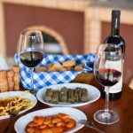 Traditional Greek dinner with dolmadakia, beans and red wine served at Casa Cinque
