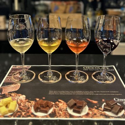 Wine and chocolate tasting with four wines paired with different types of chocolate at Cinque Wine & Deli