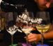 Wine tasting experience at Cinque Wine & Deli, with a sommelier pouring Greek wine into tasting glasses during a guided tasting session.