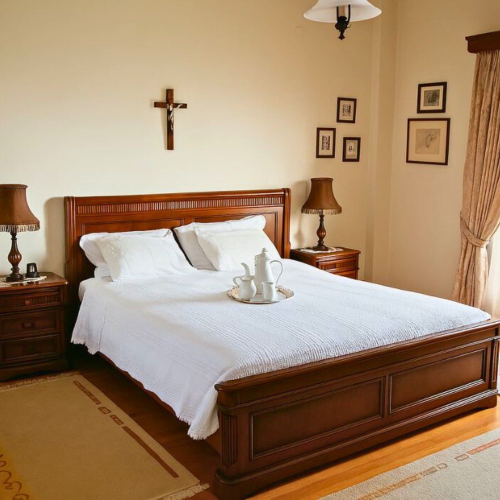 Rustic double bedroom with wooden furniture and soft natural light at the Xinomavro Suite in Casa Cinque, Lamia