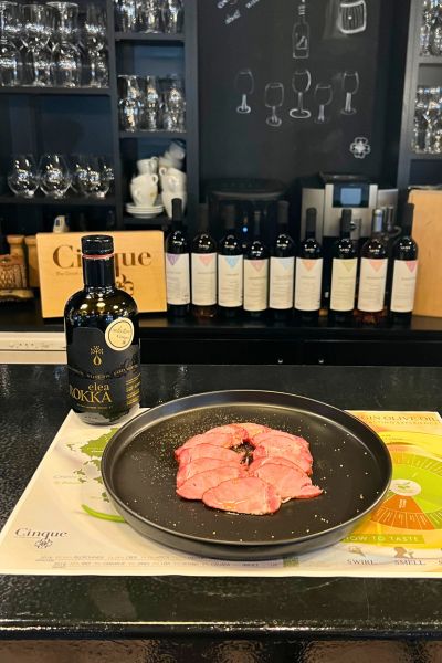 Greek smoked pork tenderloin paired with Elea Rokka Early Harvest extra virgin olive oil from Crete.