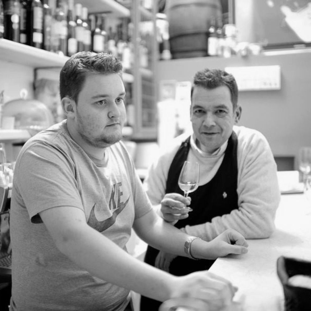 Grigoris and Nikitas Prassas behind the bar at Cinque Wine & Deli