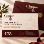 Cinque €75 corporate gift voucher in ivory, burgundy and gold, displayed with a burgundy envelope.