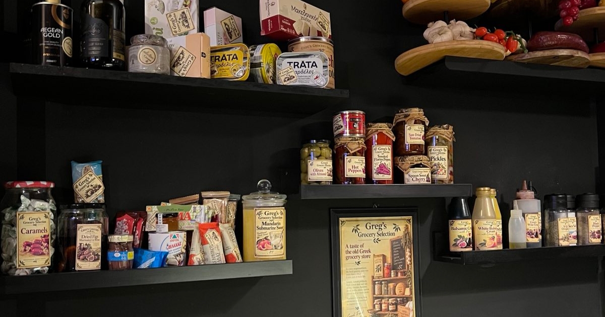 The Grocer’s Shelf at Cinque Psirri, with Greg’s Grocery Selection jars, preserves and traditional Greek grocery products